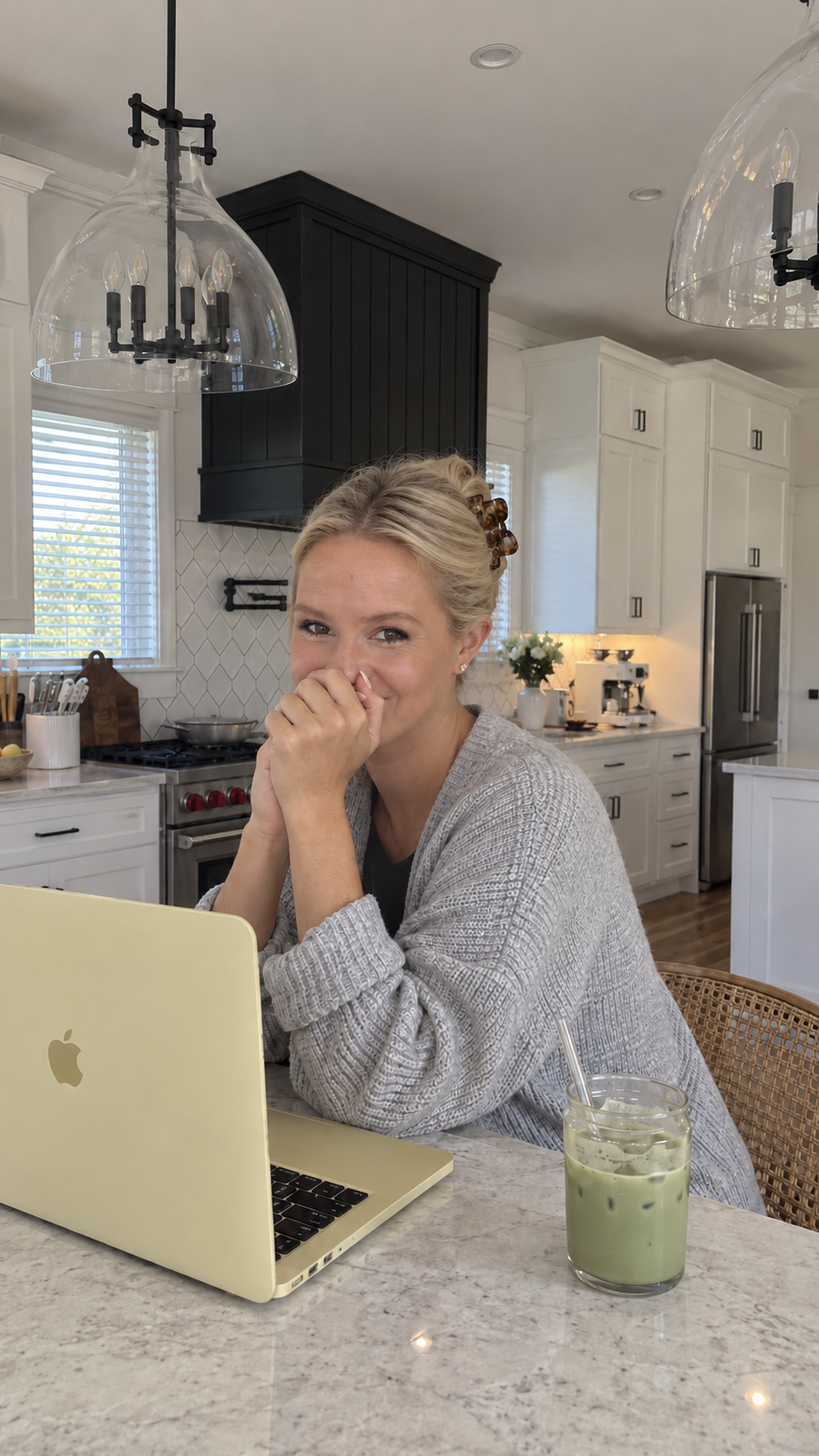 Katie Cross working at her kitchen island